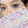 Close-up of a woman's eye decorated with colorful glitter gem stick-on facial tattoos