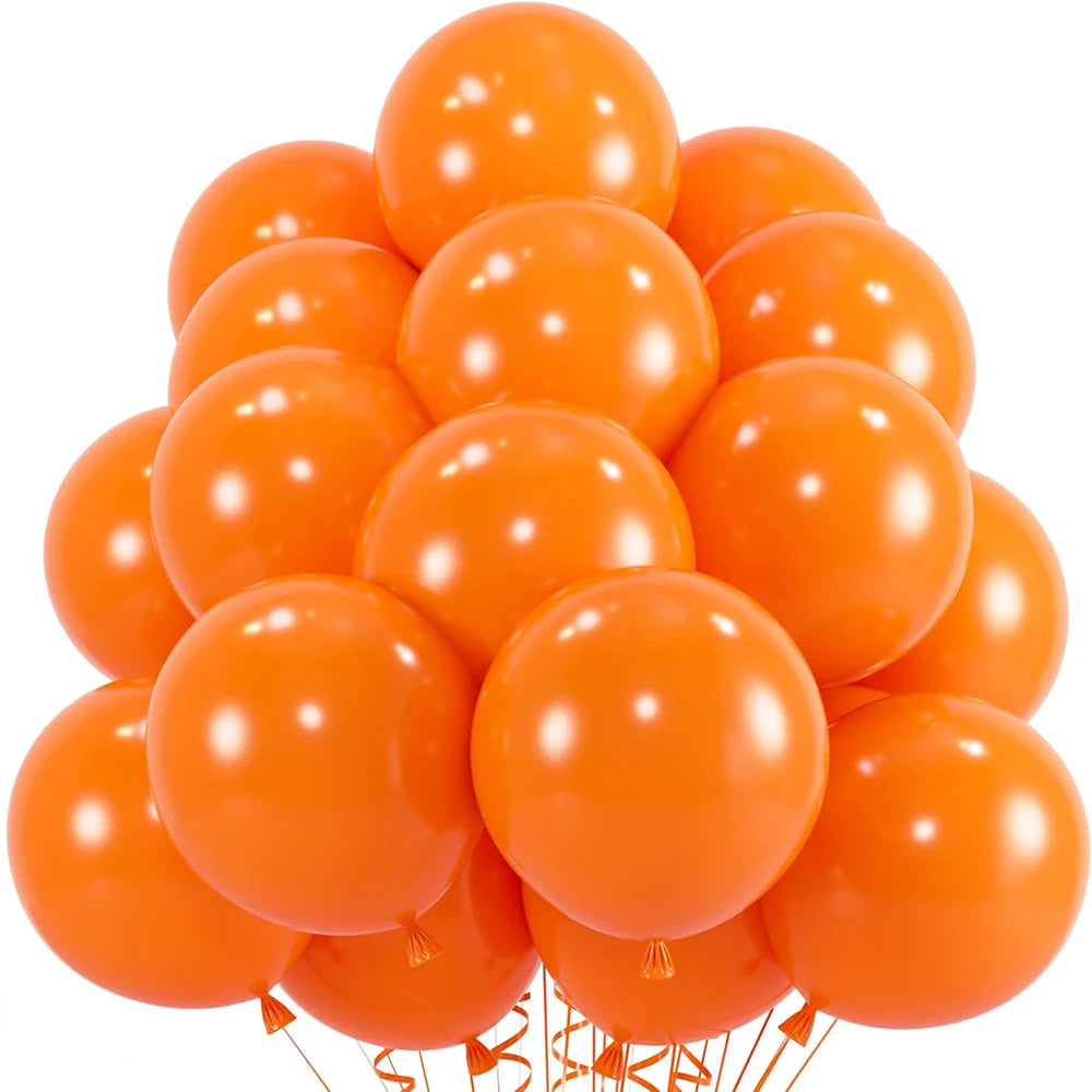 A bunch of bright orange latex balloons tied together for a party or celebration