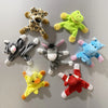 A collection of colorful animal fridge magnets including a leopard, frog, elephant, donkey, and duck designs.