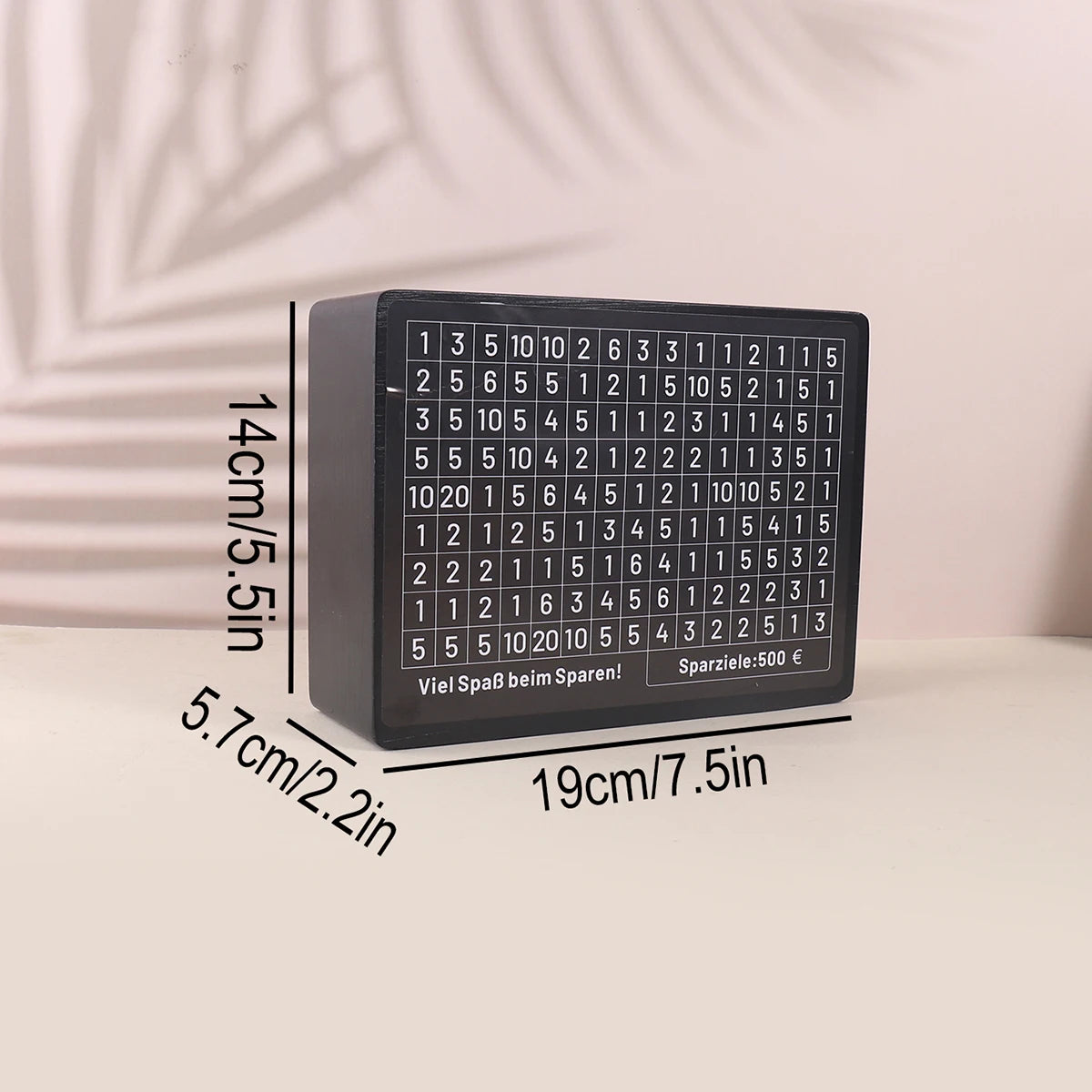 A black wooden savings box with a grid of numbered slots for saving money