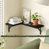 A wooden floating shelf mounted on the wall used for storing books and decorative items.