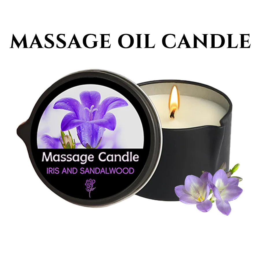 A black jar candle labeled Massage Oil Candle featuring purple iris and sandalwood scents.