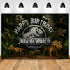 A dark jungle scene featuring various dinosaurs surrounding a 'Jurassic World' birthday banner.