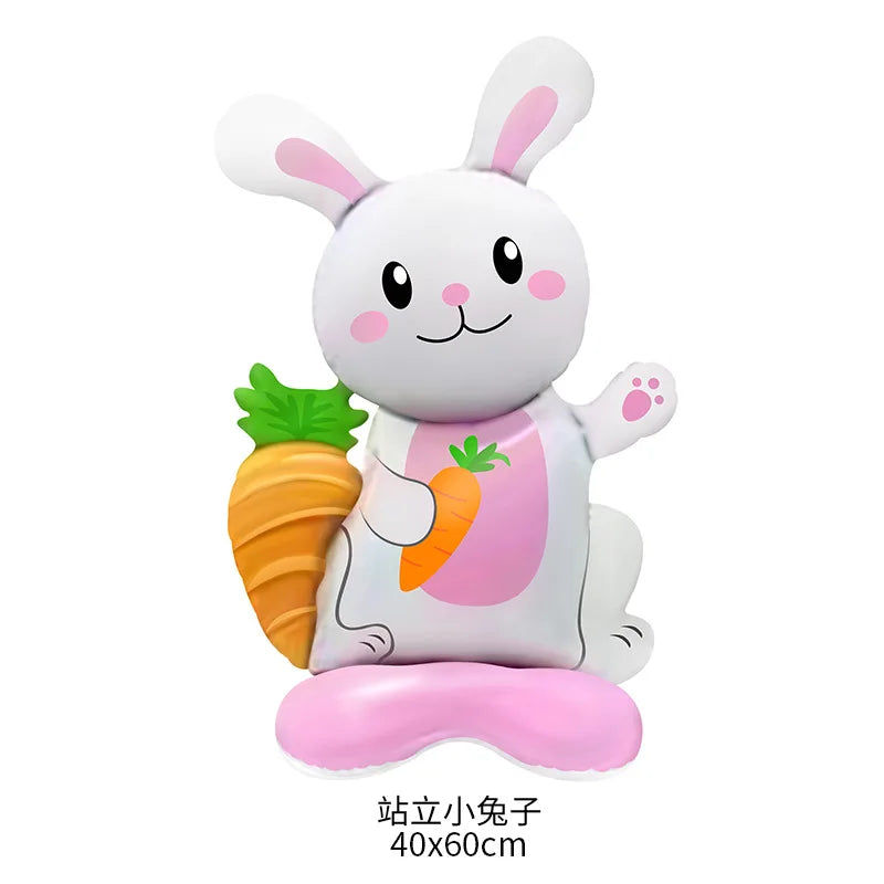 A cute white rabbit figure holding an orange carrot, used as a decoration.