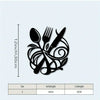 Black metal wall decor featuring a stylized fork knife and spoon design with a measurement scale.