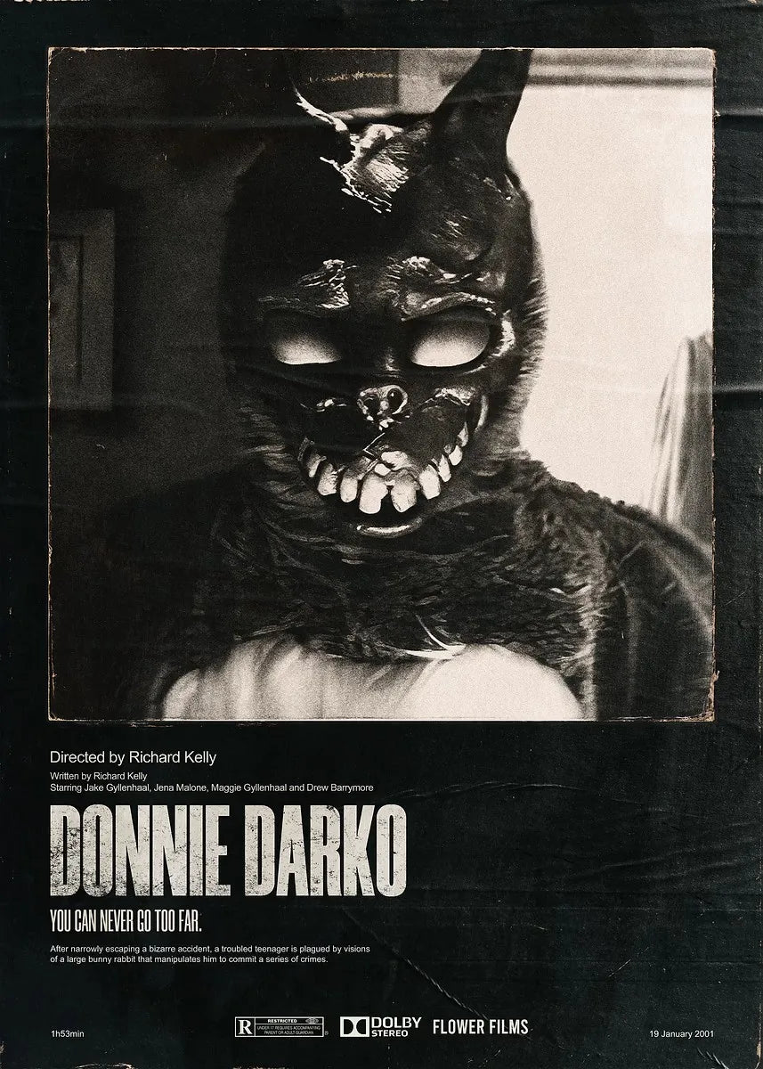 A black and white film poster featuring a menacing figure with glowing eyes and sharp teeth, titled Donnie Darko.