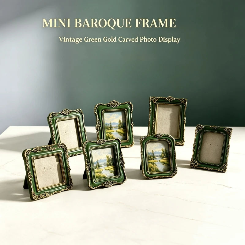 A collection of mini baroque frames in vintage green and gold carving displayed on a white surface.