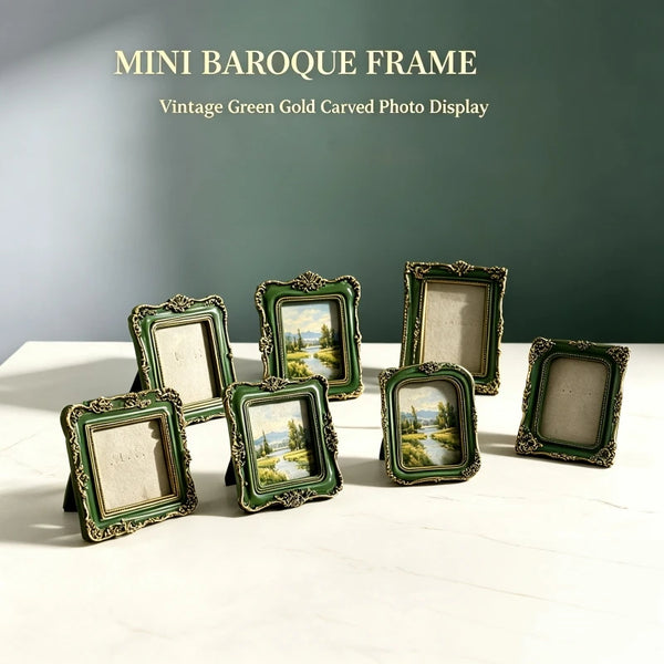 A collection of mini baroque frames in vintage green and gold carving displayed on a white surface.