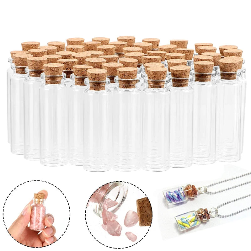 A collection of clear glass bottles with cork stoppers for crafts and storage, including some filled with colorful materials.