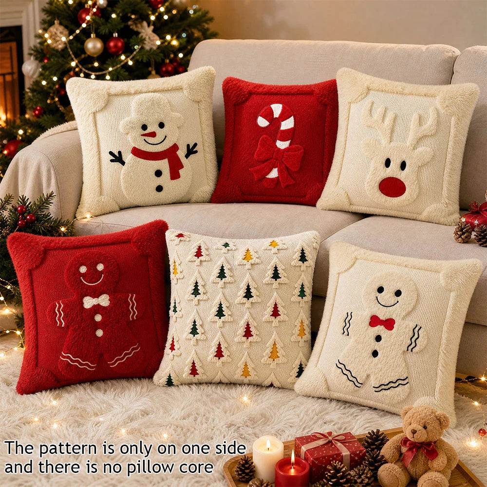 A set of festive red and cream candy cane Christmas pillows with snowman and reindeer patterns
