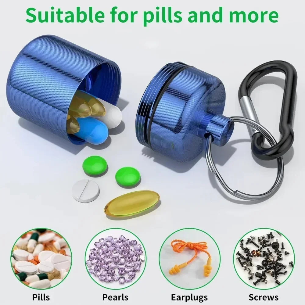 Mini waterproof pill organizer in blue plastic with a keyring, showing pills, pearls, earplugs, and screws.