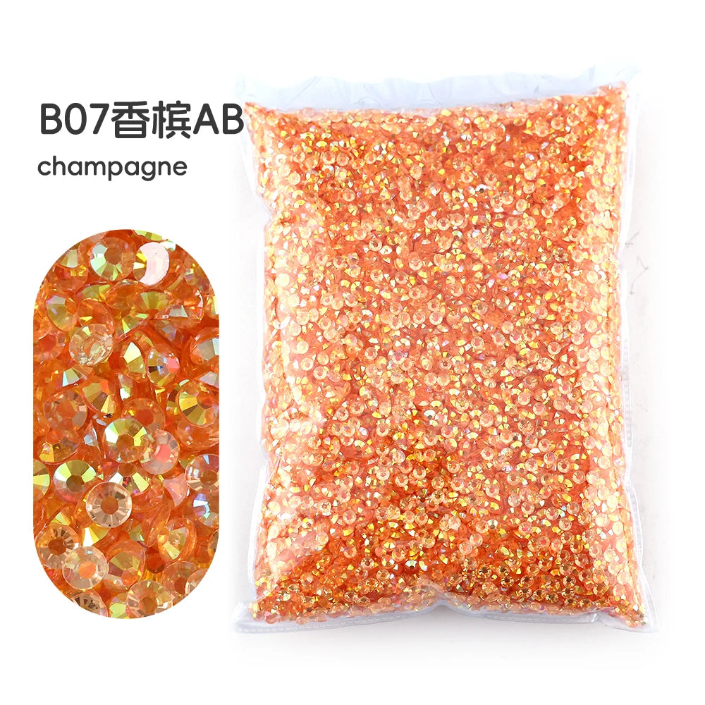 Bag of orange champagne colored resin rhinestones for crafting