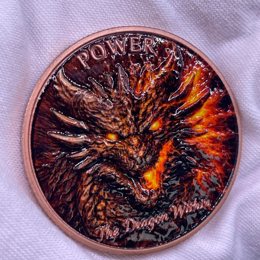 A round copper challenge coin featuring a fierce dragon head design.