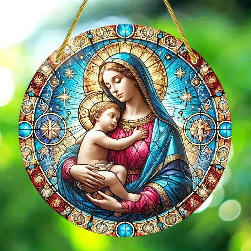 A translucent acrylic Mary Suncatcher featuring a depiction of the Virgin Mary holding the infant Jesus, set within a decorat