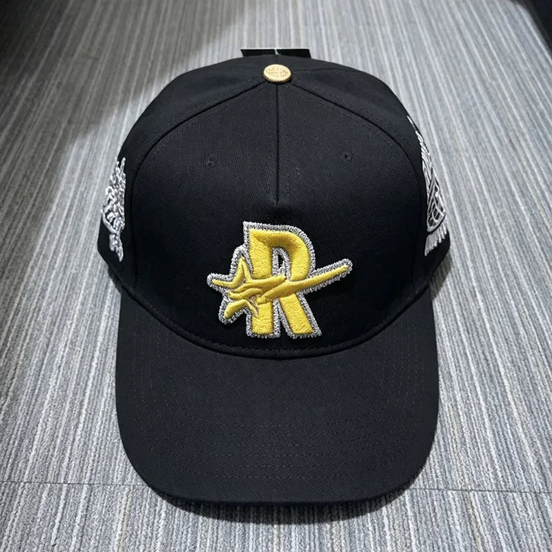 Black embroidered star hip hop baseball cap with silver and yellow detailing