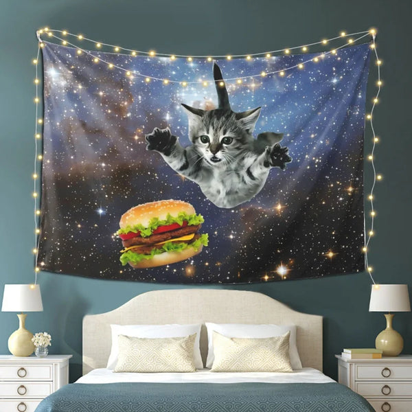 A tapestry wall hanging featuring a cat and a burger against a starry space background.