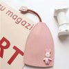 A pink cartoon PU leather key holder with a pull-out design attached to a card.