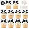 A set of ten pink bow cupcake toppers featuring white frosting and gold accents.