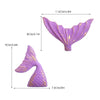 Purple mermaid tail cake topper featuring a seashell and sea star decoration.