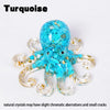 Turquoise crystal octopus statue with gold accents