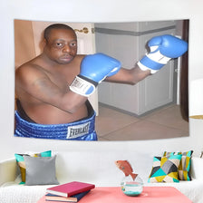 A large decorative boxing flag wall tapestry featuring a muscular man wearing blue boxing gloves.