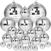 A collection of silver mirror balls with hanging hooks.