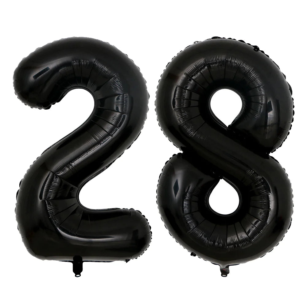 A set of two giant black foil balloons shaped like the number 28