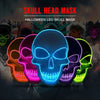 A collection of glowing LED skull masks in various colors displayed against a dark background.