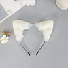White plush fox ears headband with black nose bridge and ear straps