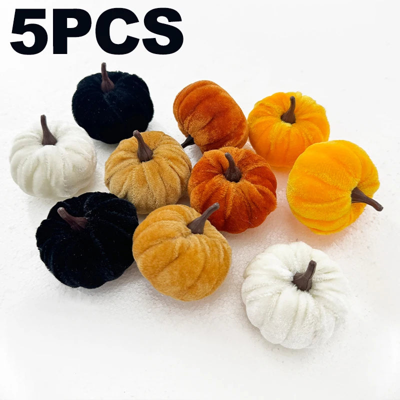 A set of five foam pumpkins in various colors including black, white, orange, and gold.