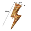Nahaufnahme eines gepunkteten Leopardenmuster-Flimmervorhangs, 105 cm lang und 35 cm breit.