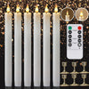 A set of white LED taper candles with a remote control and timer, shown next to candle holders.