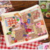 A page from a die cut sticker pack featuring retro cartoon pets and various illustrations for scrapbooking