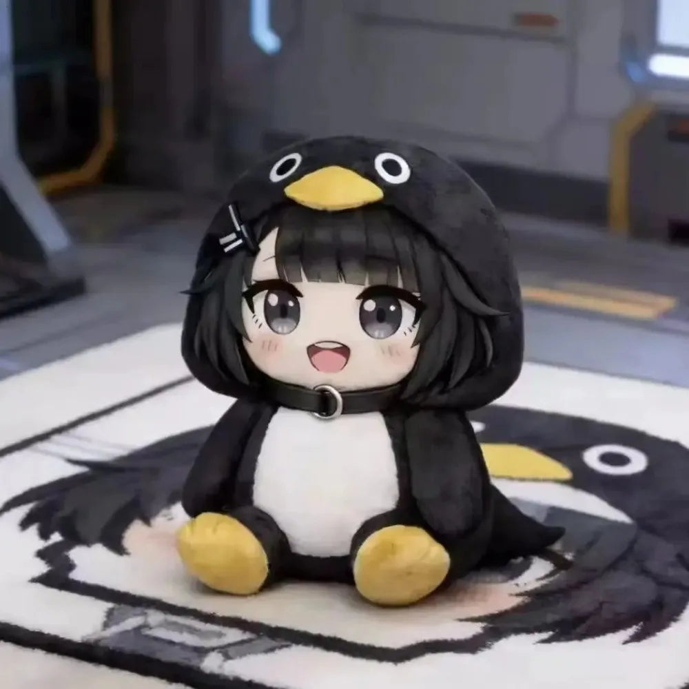A cute kawaii penguin plush doll with black and white coloring sitting on a white surface.