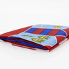 A folded flag banner featuring blue, red, and white stripes with yellow stars on a wooden pole.