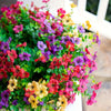 A vibrant bouquet of Uv-resistant artificial daisy flower bundles in shades of pink, red, purple, and yellow.