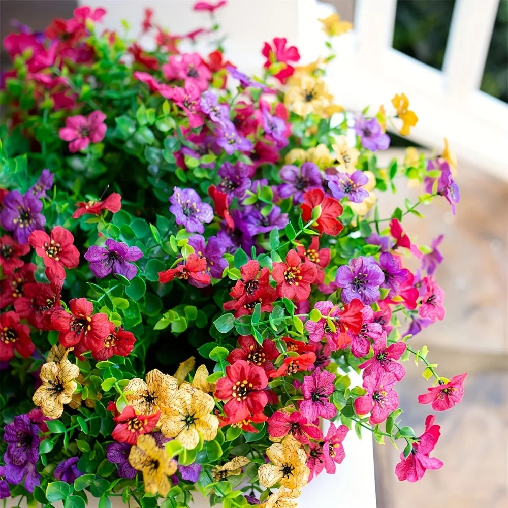 A vibrant bouquet of Uv-resistant artificial daisy flower bundles in shades of pink, red, purple, and yellow.