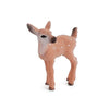 A small, brown figurine of a dog with white spots, resembling a farm animal.