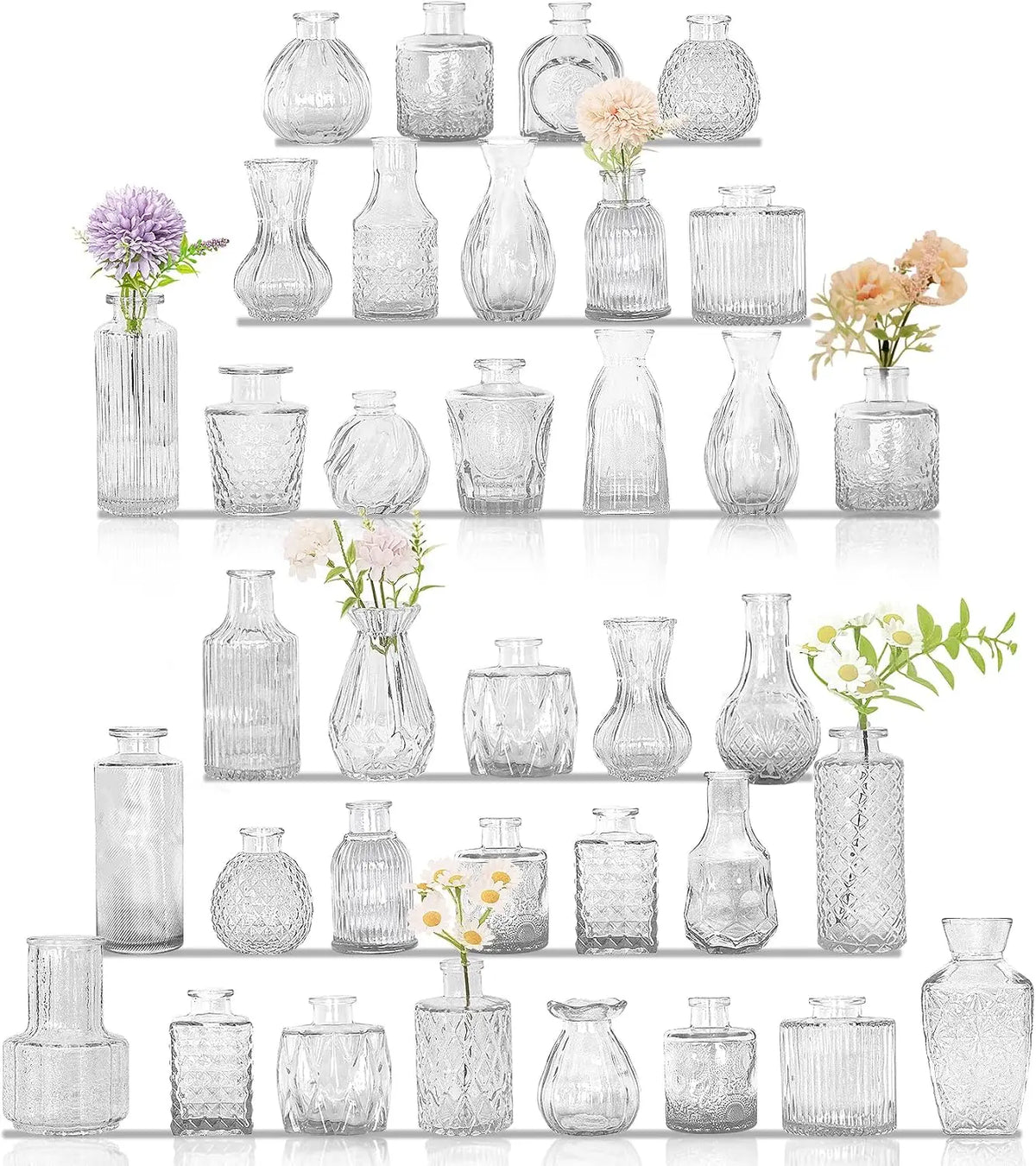 A collection of vintage bud glass vases in various shapes and sizes arranged in a vertical display.