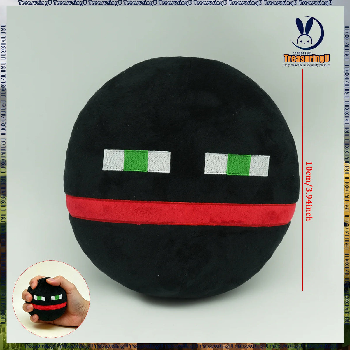 A black plush doll with white and green rectangular eyes and a red band around the neck.