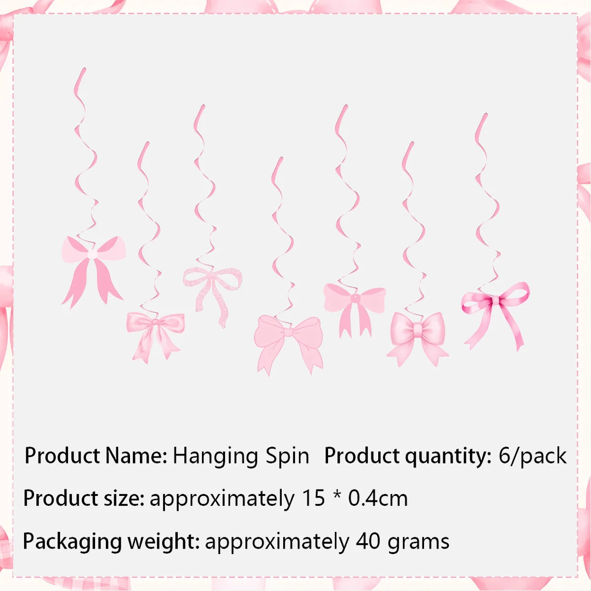 A set of pink hanging spin bow cupcake toppers for birthday and bridal shower decorations.