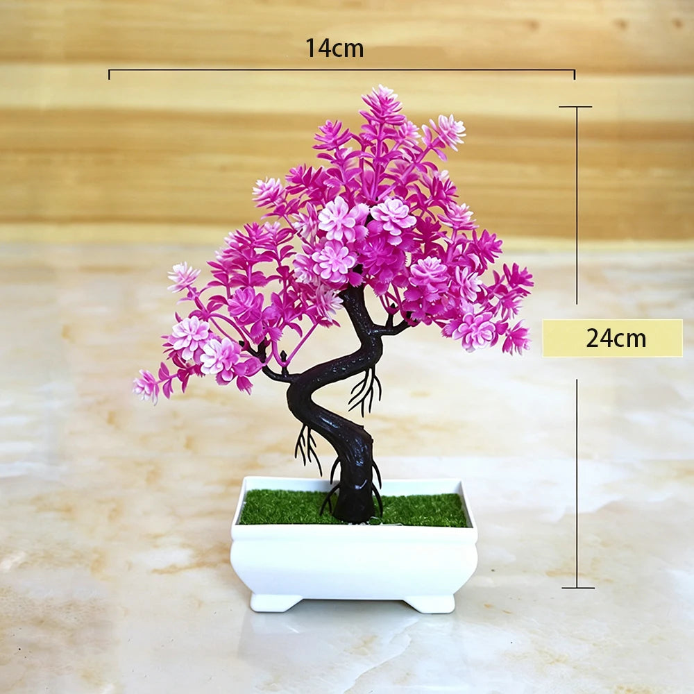 A vibrant pink artificial bonsai tree decoration planted in a white rectangular pot.