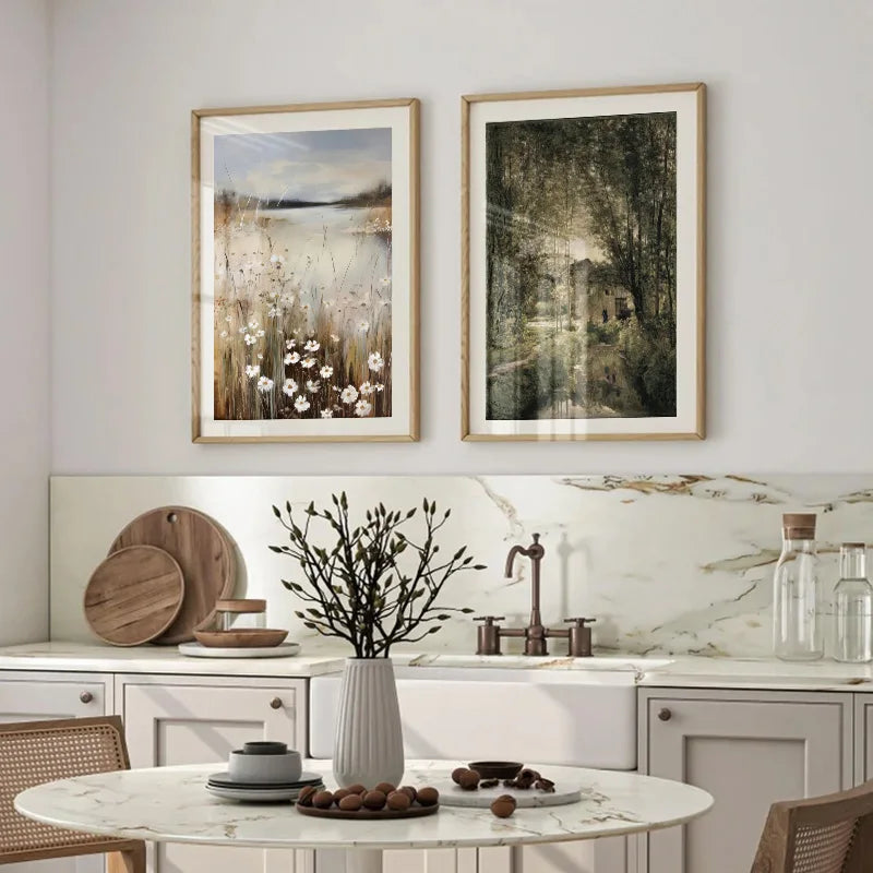 Framed canvas art featuring a misty countryside scene with spring flowers and trees hanging on a white wall.