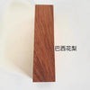 A vertical rectangular blank of reddish-brown wood, likely a natural wood blank for knife handles or DIY projects.