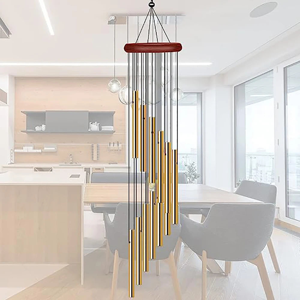 A hanging wind chime set featuring twelve tubes with gold and silver bells suspended from a wooden bar.