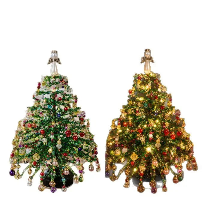 A festive green Christmas tree decorated with sparkling crystal beads and ornaments.