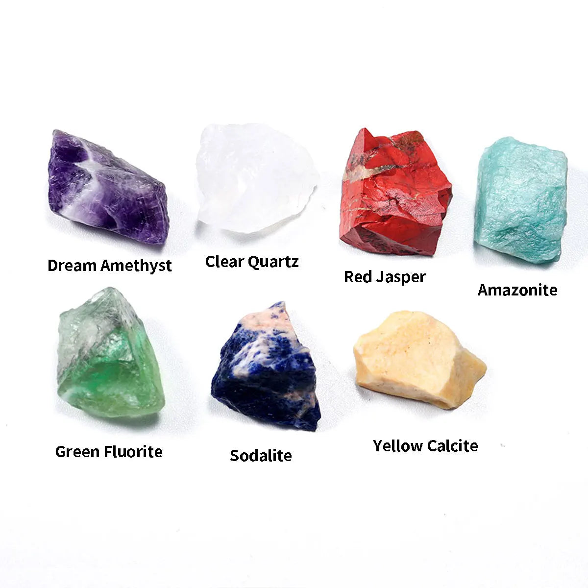 A collection of natural crystals including Dream Amethyst, Clear Quartz, Red Jasper, Amazonite, Green Fluorite, Sodalite, and