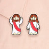An enamel lapel pin depicting Jesus with a beard and long hair wearing a white garment and a red sash.