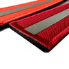 A close-up of an IR reflective medical cross tactical morale patch with a red background and a silver stripe.