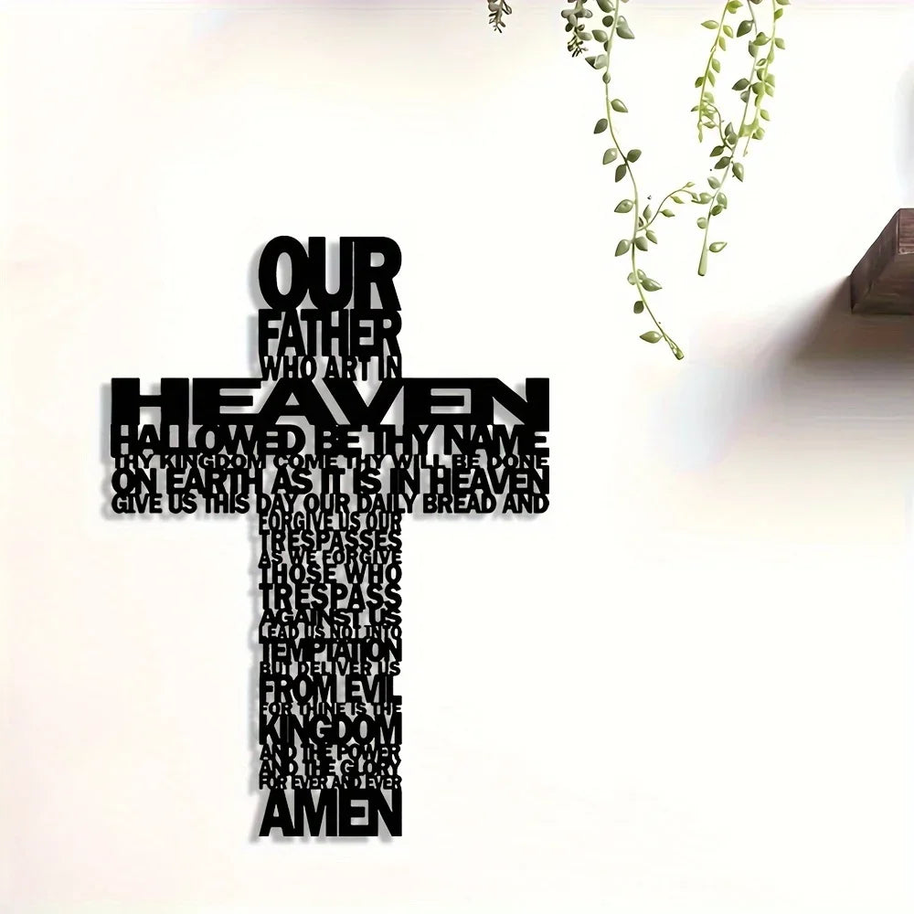Black metal cross wall art featuring the text Our Father in Heaven and Amen with green vines above